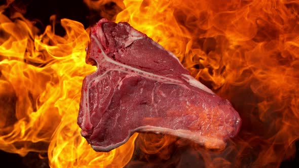 Super Slow Motion Footage of Premium Tbone Meat in Fire at 1000Fps alt