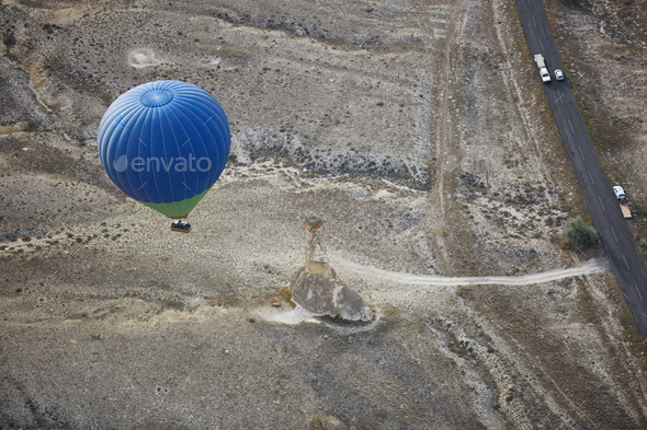 Blur hot air balloon flying over the road with motor transport. View from above - Stock Photo - Images