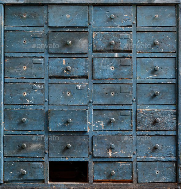 Wooden cabinet with drawers Stock Photo by sergeyskleznev