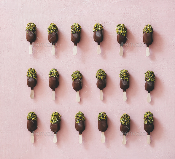 Chocolate glazed popsicle ice-cream with pistachio icing, top view - Stock Photo - Images