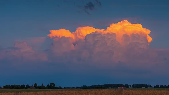 Cumulonimbus storm Clouds at Sunset, timelapse video of explosive clouds