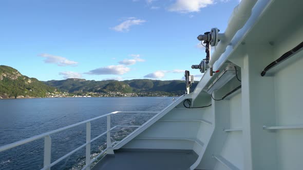 Passengers view from Hydrogen powered ferry Hydra - Walking against fence and looking astern with Hj alt