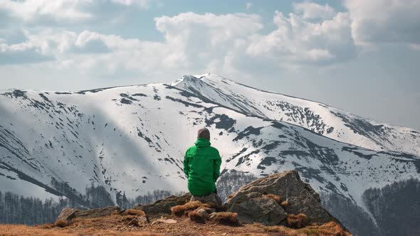 Man Sit on Rock in Spring Mountains