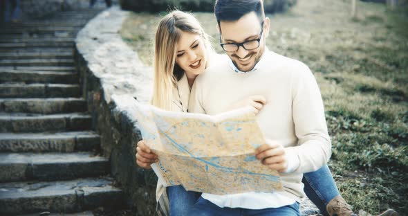 Beautiful Couple Sightseeing and Traveling Together  Tourism Concept
