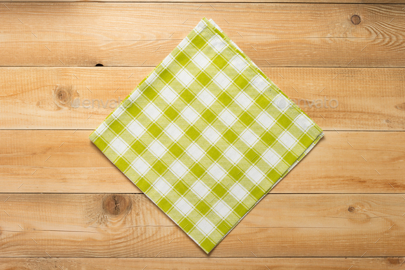 cloth napkin on at rustic wooden table