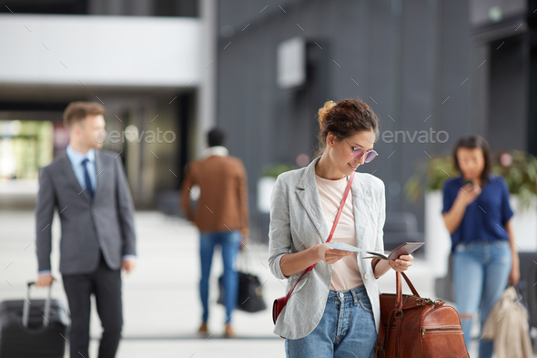 Checking boarding pass - Stock Photo - Images