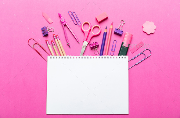 Flat lay of office, school stationery on pink background Stock Photo by  rawf8