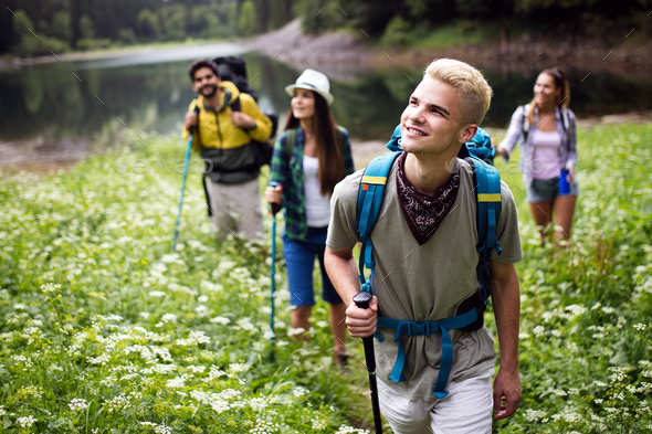 Habubu ondsindet Byttehandel Group of young friends hiking in countryside. Multiracial happy people  travelling in nature Stock Photo by nd3000