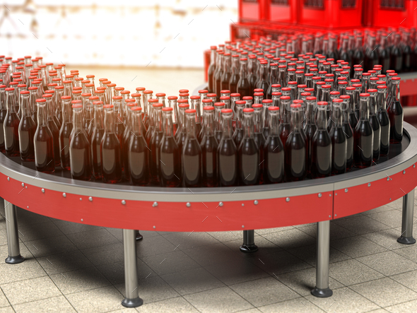 Production of soda bverages or cola. A row of bottles on conveyo