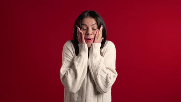 Portrait of Girl with Long Hair, Claps Her Hands with Delight. Surprised Woman alt