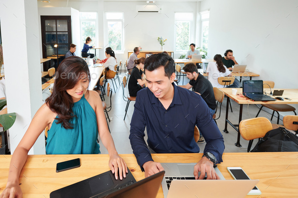 Business people working with computers - Stock Photo - Images
