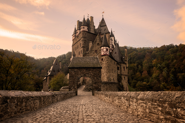 Burg Eltz Castle at sunrise in autumn Stock Photo by iPics | PhotoDune