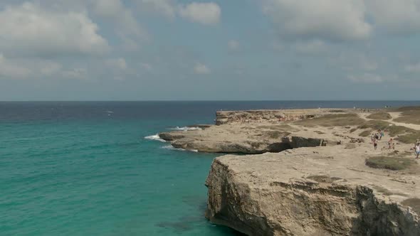 Mediterranean coast with cliffs in the region of  Salento, Italy, Aerial drone  view of clear blue w alt