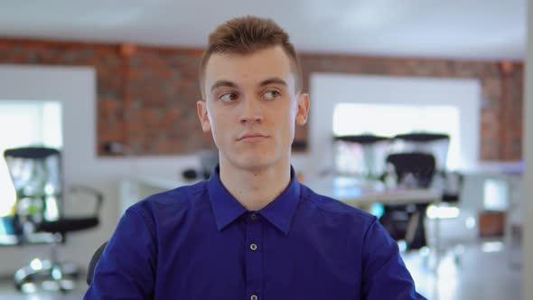 Fair-haired Businessman at Work alt