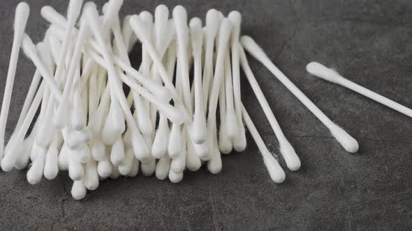 Ear sticks stacked pile isolated on black background