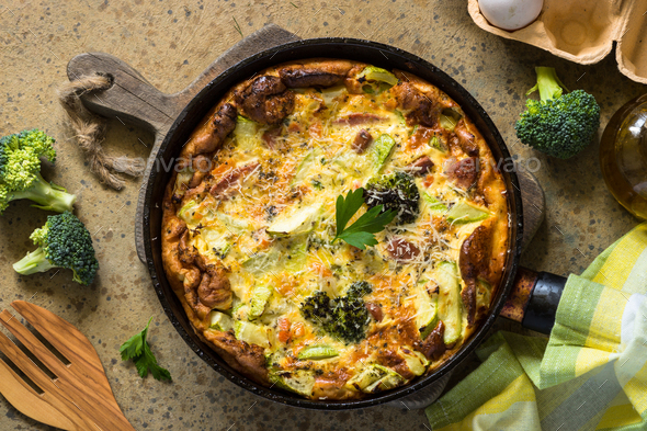 Frittata with sausage and vegetables in skillet