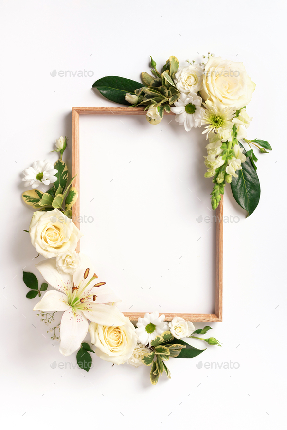 Frame of rose, lily, gerbera flowers over white background. Valentines day,  Woman day concept Stock Photo by jchizhe