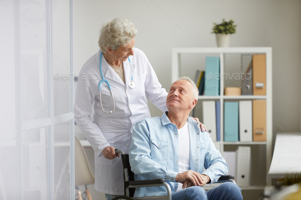 Handicapped Man in Clinic - Stock Photo - Images