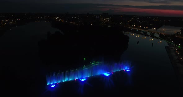 Fountain With Colorful Illuminations At Night alt