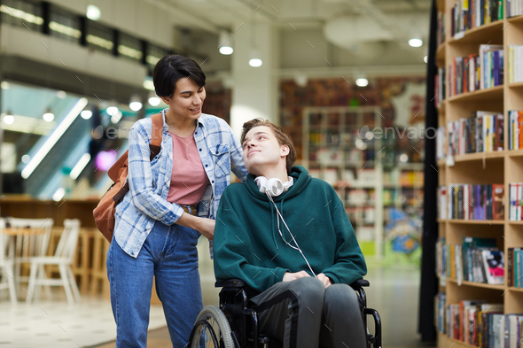 Taking care of disabled student - Stock Photo - Images