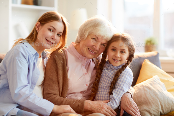 Grandmother Posing with Family - Stock Photo - Images