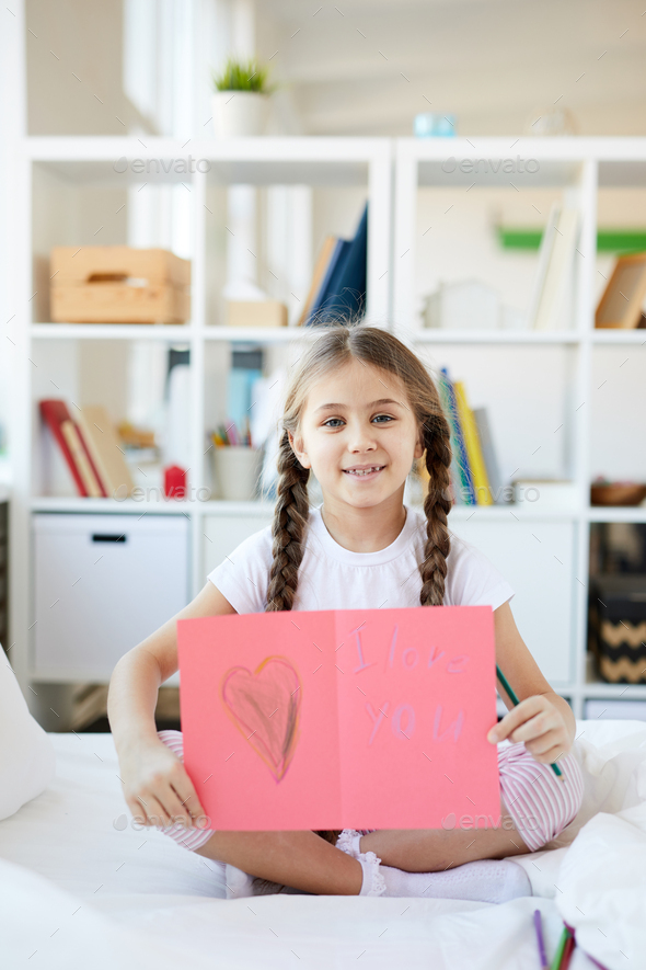 Girl Showing Handmade Card - Stock Photo - Images