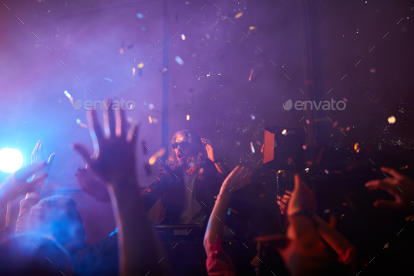 Incendiary atmosphere at performance of dj - Stock Photo - Images