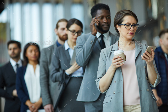 Entrepreneurs standing in line - Stock Photo - Images