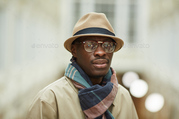 African Man Posing in Street - Stock Photo - Images