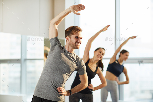 General yoga class for men and women - Stock Photo - Images