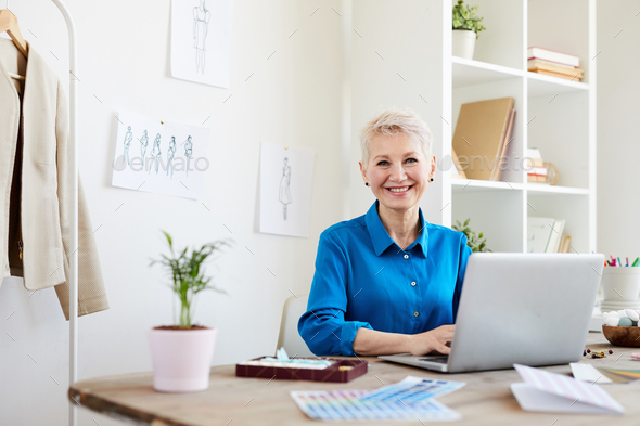 Woman surfing in the net - Stock Photo - Images