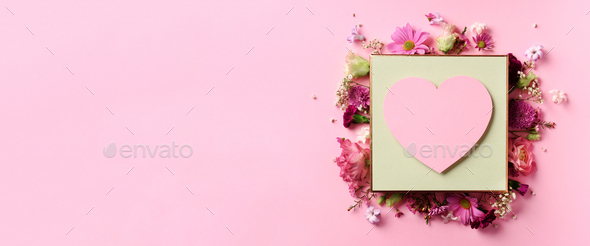 Frame of pink flowers over punchy pastel background. Valentines day, Woman day concept. Spring or - Stock Photo - Images