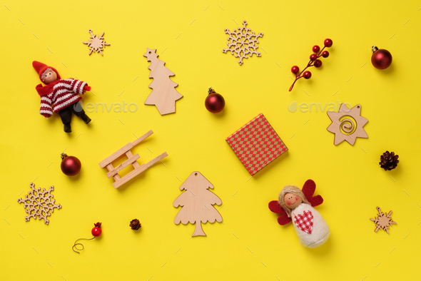 Greeting card for New year party. Christmas gifts, decorative elements and ornaments on yellow - Stock Photo - Images