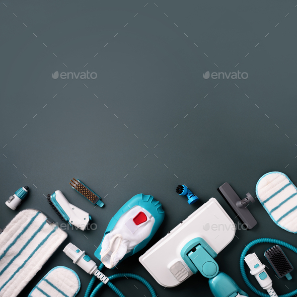 Set with modern professional steam cleaners on grey background. Top view, flat lay. Banner with copy - Stock Photo - Images