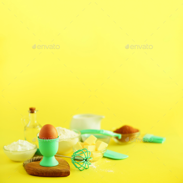 Bakery food frame, cooking concept. Different baking ingredients - butter, sugar, flour, milk, eggs - Stock Photo - Images