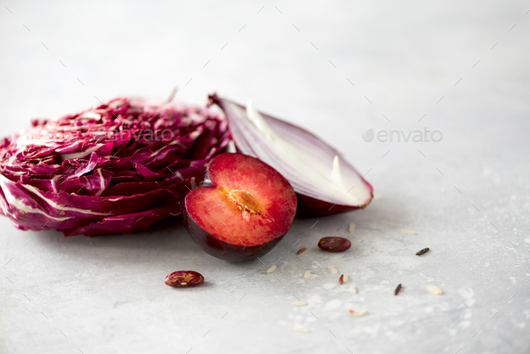 Clean eating concept. Raw purple vegetables on gray concrete background. Violet eggplant, beets - Stock Photo - Images