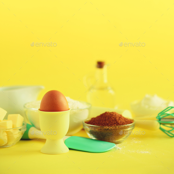 Bakery food frame, cooking concept. Different baking ingredients - butter, sugar, flour, milk, eggs - Stock Photo - Images