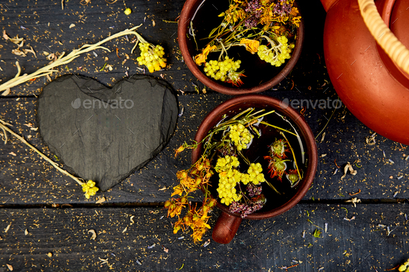 Two Cup of herbal tea. Dry Herbs and flowers, herbal medicine. - Stock Photo - Images