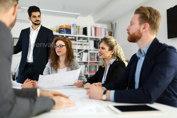 Group of architects working together on project - Stock Photo - Images