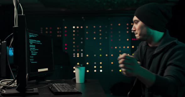 A Nervous Hacker with Dark Circles Under His Eyes Hits the Table with Nerves After alt