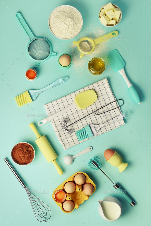 Square crop. Baking ingredients - butter, sugar, flour, eggs, oil, spoon, rolling pin, brush, whisk - Stock Photo - Images