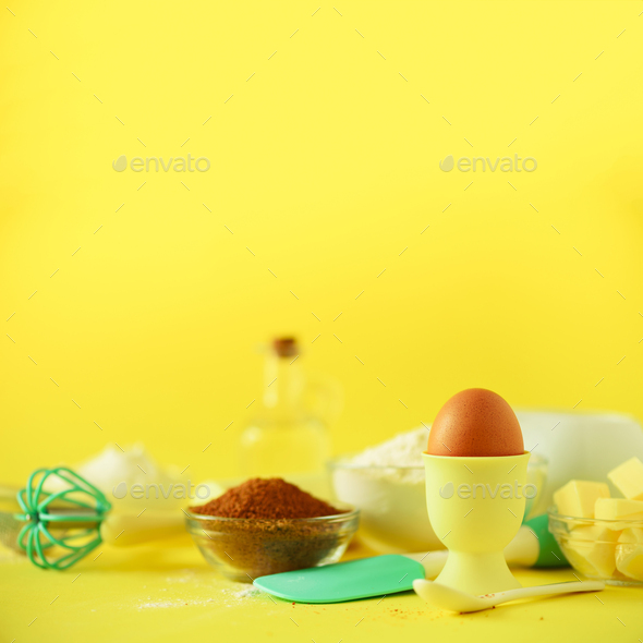 Bakery food frame, cooking concept. Different baking ingredients - butter, sugar, flour, milk, eggs - Stock Photo - Images