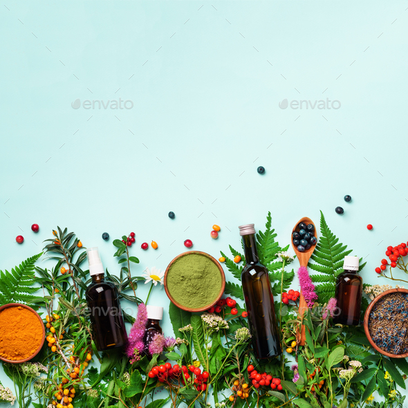 Healthy super food, berries, turmeric, spirulina, omega acid capsules, vitamin c supplement - Stock Photo - Images