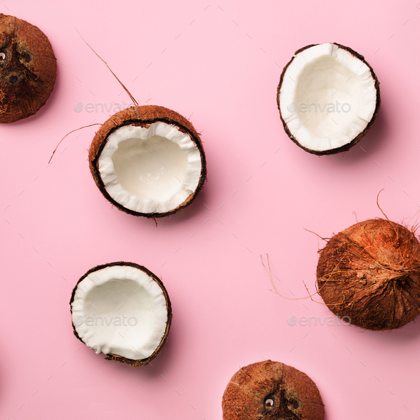Pattern with ripe coconuts on pink background. Top View. Copy Space. Square crop. Pop art design - Stock Photo - Images