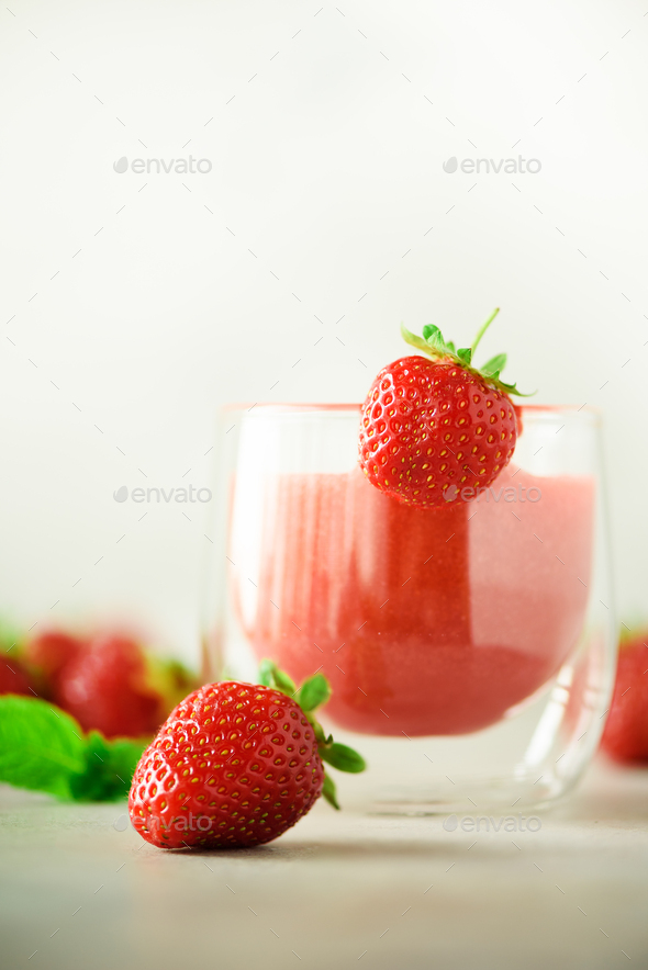 Healthy strawberry smoothie in glass on gray background with copy space. Banner. Summer food and - Stock Photo - Images