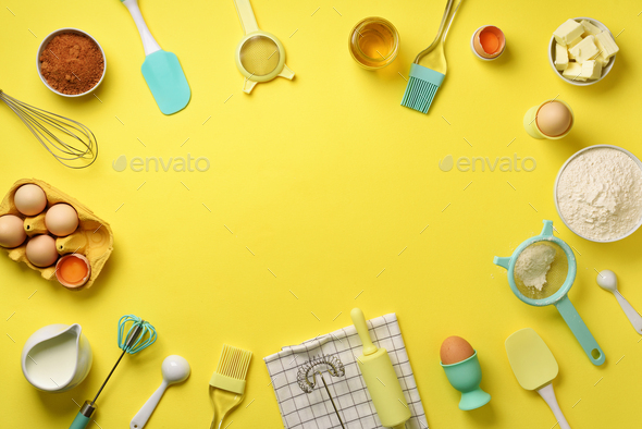Time to bake. Baking ingredients - butter, sugar, flour, eggs, oil, spoon, rolling pin, brush, whisk - Stock Photo - Images