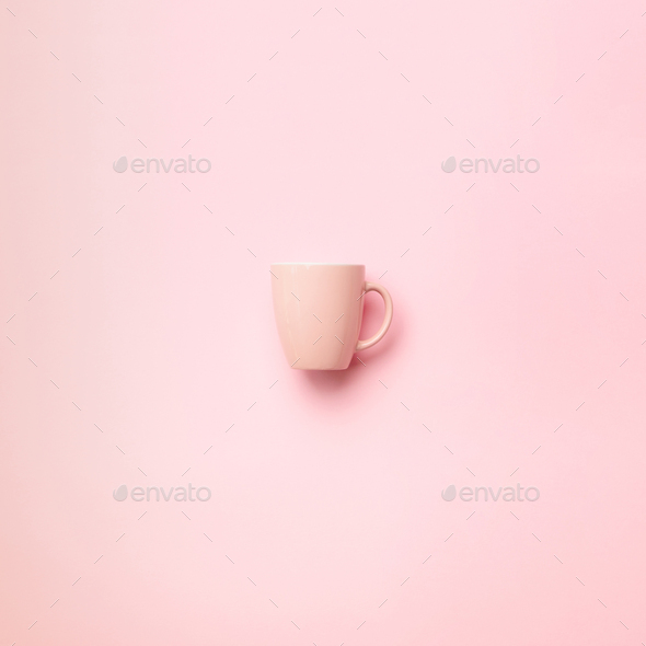 Pink cup over punchy background. Square crop. Birthday party celebration, baby shower concept - Stock Photo - Images