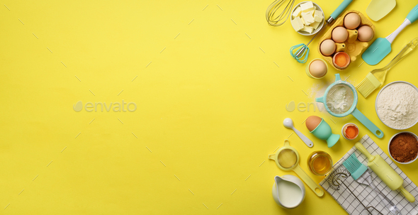 Banner of baking ingredients - butter, sugar, flour, eggs, oil, spoon, rolling pin, brush, whisk - Stock Photo - Images