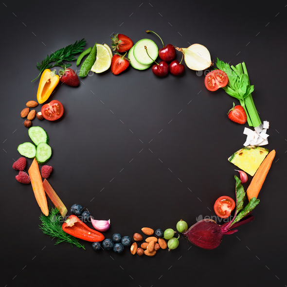Healthy food background. Circle of organic vegetables, fruits, nuts, berries with copy space on - Stock Photo - Images
