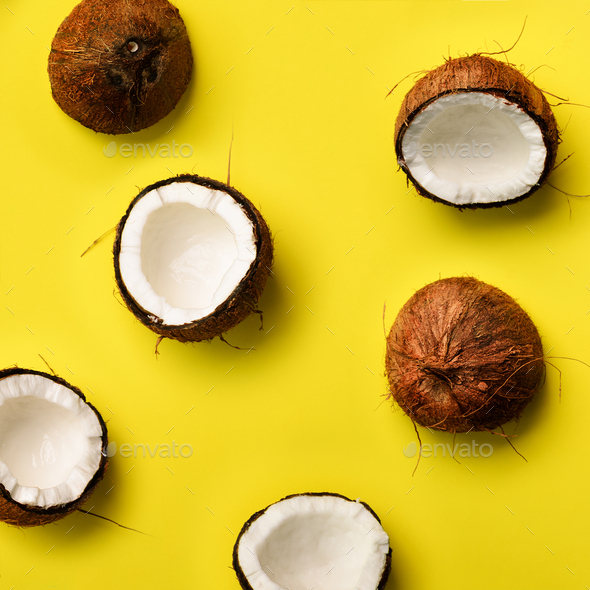 Pattern with ripe coconuts on yellow background. Top View. Copy Space. Square crop. Pop art design - Stock Photo - Images